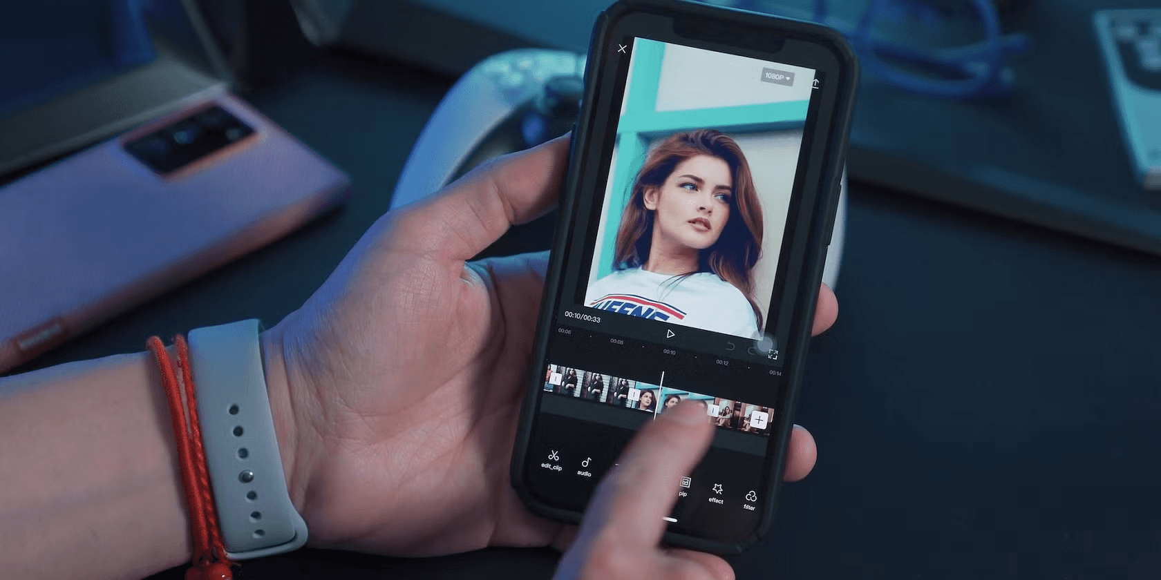 Person editing video on mobile phone - How To Do Voiceover On Capcut